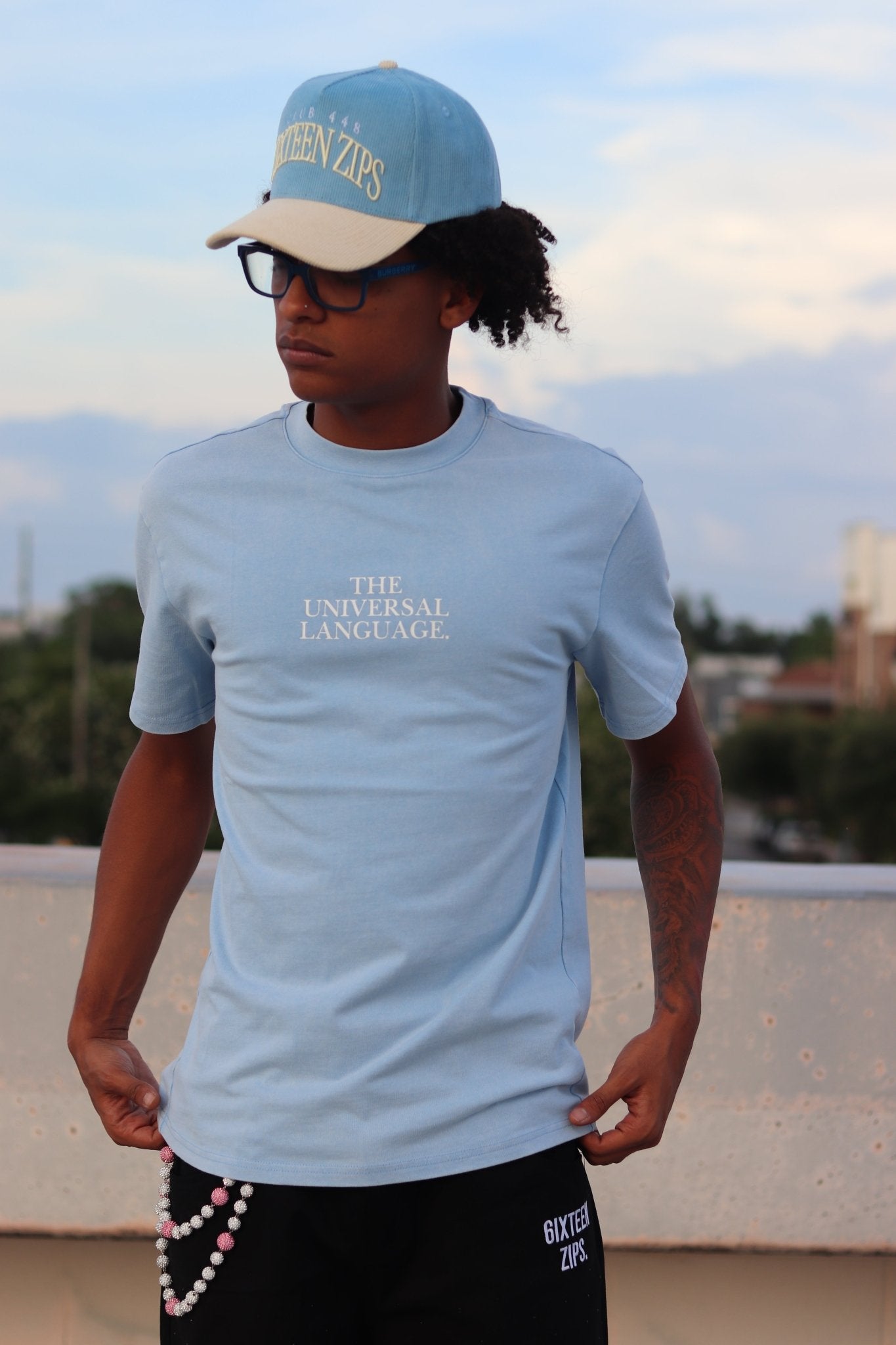 "The Universal Language" Sky Blue Acid Washed Boxy T-shirt - 6IXTEEN Zips