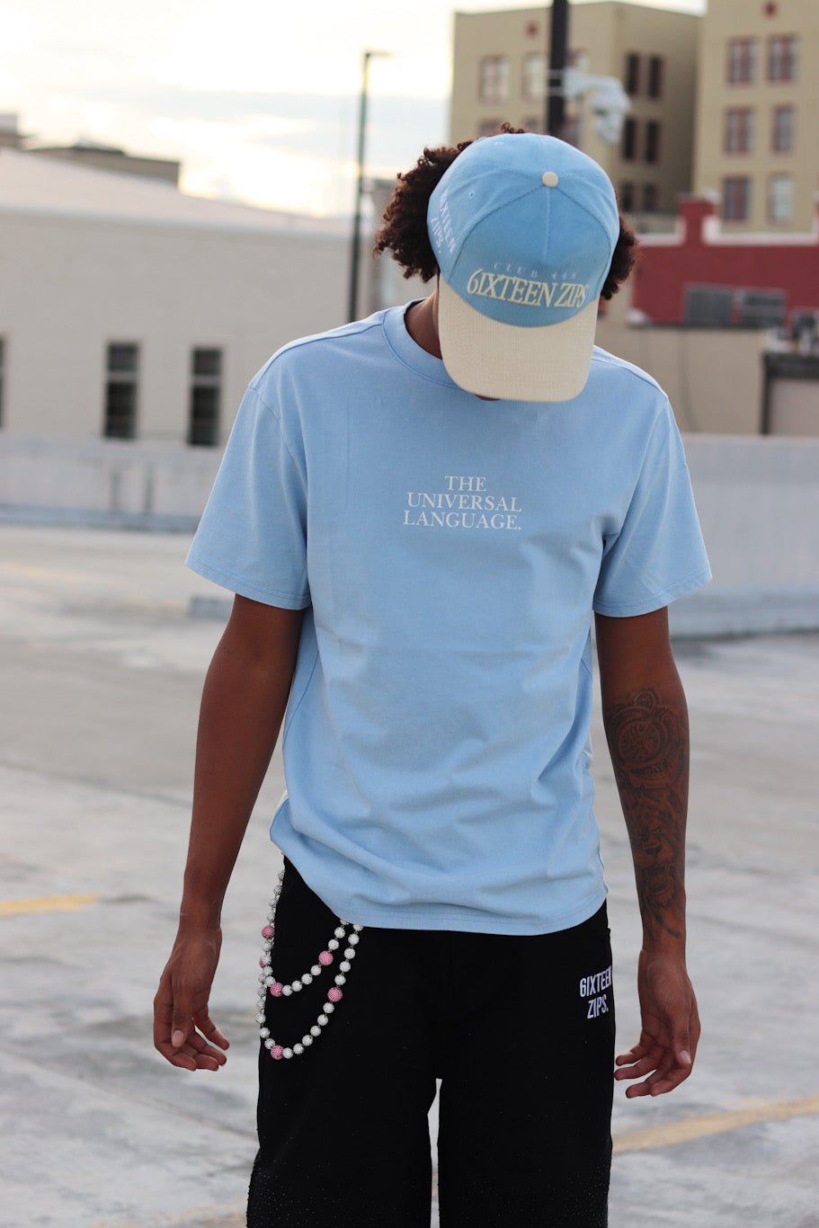 "The Universal Language" Sky Blue Acid Washed Boxy T-shirt - 6IXTEEN Zips