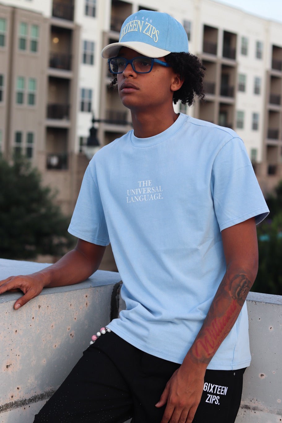 "The Universal Language" Sky Blue Acid Washed Boxy T-shirt - 6IXTEEN Zips